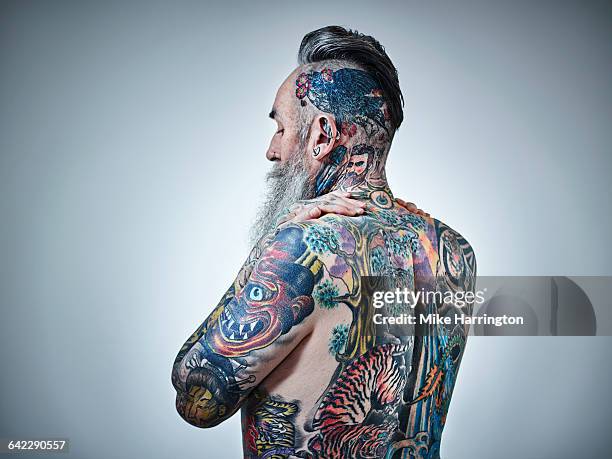 117 Heavily Tattooed Men Photos and Premium High Res Pictures - Getty Images 117 Heavily Tattooed Men Photos and Premium High Res Pictures - Getty Images