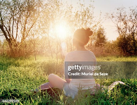 Young woman enjoying sunset Young woman enjoying sunset