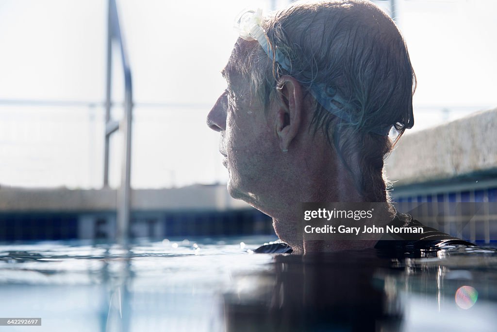 Senior man in swimming pool