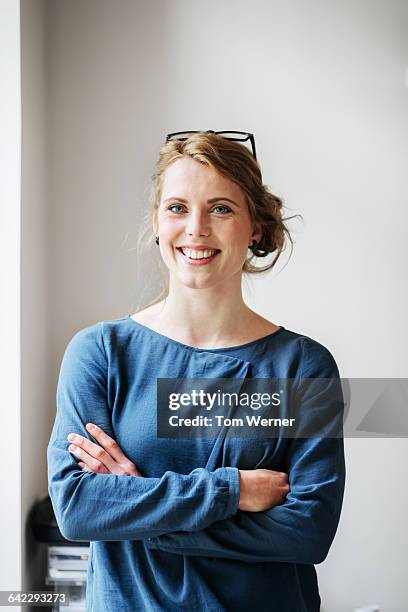 portrait of a young casual start up businesswoman - woman portrait waist up stock pictures, royalty-free photos & images