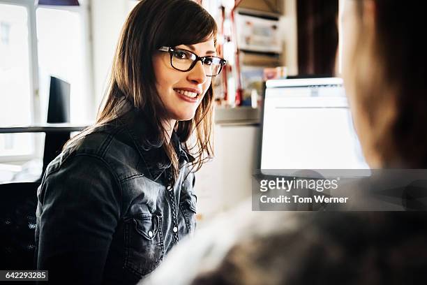 portrait of a young female graphic designer - leanincollection stockfoto's en -beelden