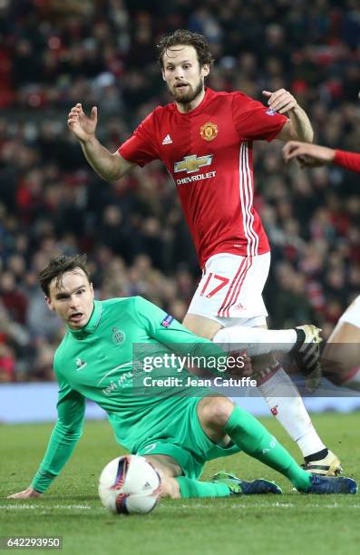 Daley Blind of Manchester United and Ole Selnaes of Saint-Etienne in action during the UEFA Europa League Round of 32 first leg match between...