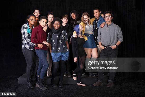 group of twelve multi-ethnic students. - class photo stock pictures, royalty-free photos & images