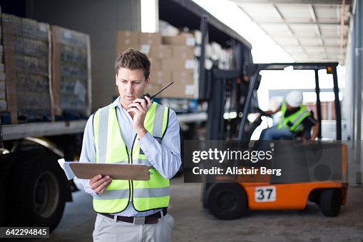 Loading Labour Workers Loading A Lorry At A Large Warehouse High-Res Stock Photo ...