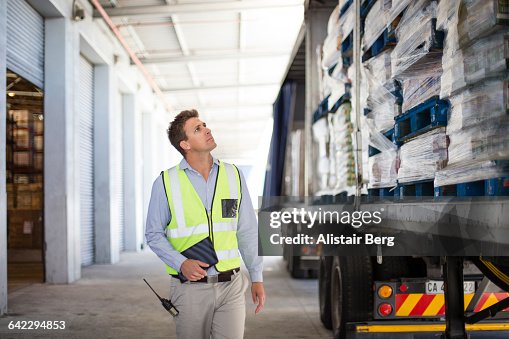Loading Representative Workers Loading A Lorry At A Large Warehouse High-Res Stock Photo ...
