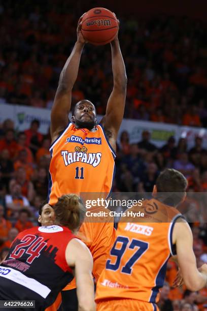 Tony Mitchell of the Taipans takes a rebound during the NBL Semi Final Game 1 match between Cairns Taipans and Perth Wildcats at Cairns Convention...