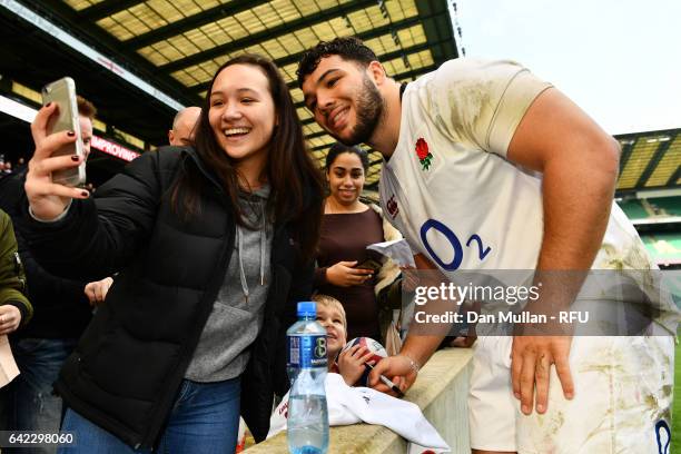 Ellis Genge poses for photographs with fans during an England open training session at Twickenham Stadium on February 17, 2017 in London, England.