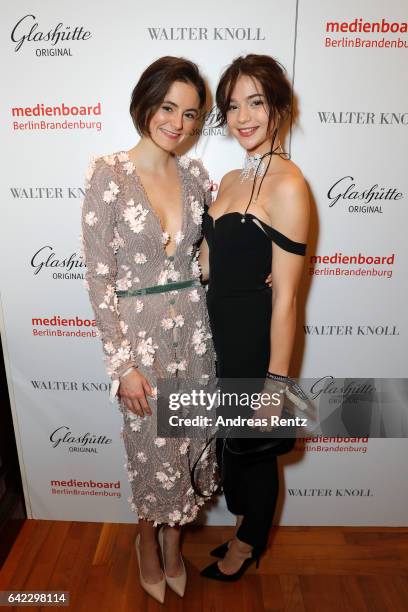 Lea van Acken and Lisa-Marie Koroll attend the Medienboard Berlin-Brandenburg Reception sponsored by Glashuette Original on February 9, 2017 in...