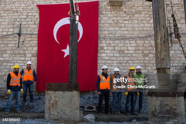 Construction workers begin digging at the site of the new controversial Taksim Mosque after a ground breaking ceremonyon February 17, 2017 in...