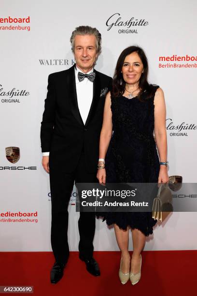 Of Glashuette Original Thomas Meier and his wife attend the Medienboard Berlin-Brandenburg Reception sponsored by Glashuette Original on February 9,...