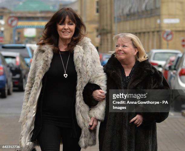 Actresses Vicki Michelle and Sue Hodge arrive for the funeral of 'Allo 'Allo star Gorden Kaye at Huddersfield Parish Church.