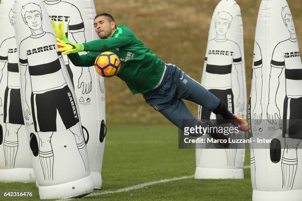 Juan Pablo Carrizo of FC Internazionale Milano dives to save a shot during the FC Internazionale training session at the club's training ground "La...