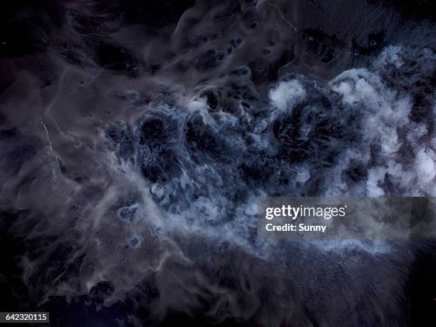 close up of liquid nitrogen in nebulous shapes - liquid nitrogen stock pictures, royalty-free photos & images