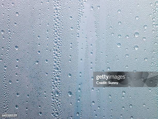 water drops, dew on window - kondenswasser stock-fotos und bilder