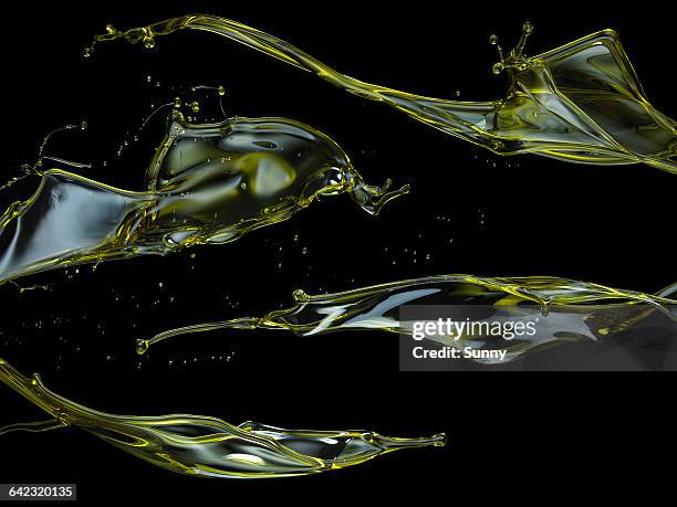 olive oil in action - oil flow imagens e fotografias de stock