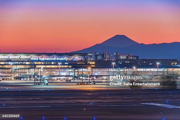 tokyo international airport after sunset - tokyo international airport stock pictures, royalty-free photos & images