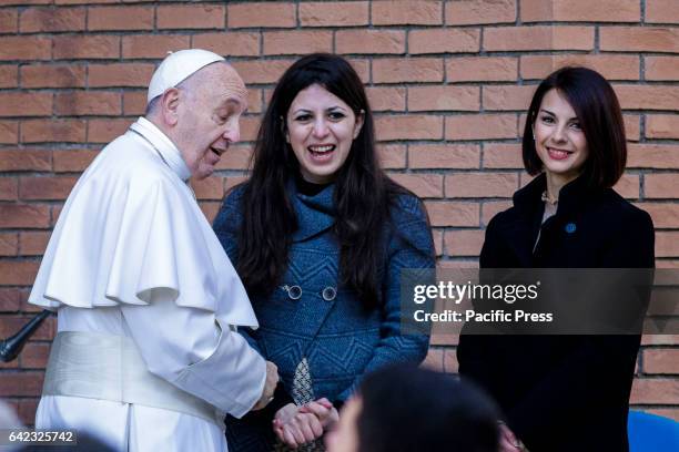 Pope Francis meets Nour Essa , a Syrian refugees arrived in Rome with Pope Francis from the Greek island of Lesbos, at the Roma Tre University, one...