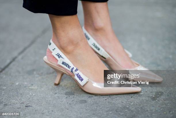 Jadior Dior heels outside Marc Jacobs on February 16, 2017 in New York City.