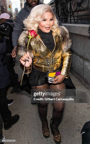 Rapper Lil' Kim is seen leaving the Marc Jacobs Fall 2017 Show at Park Avenue Armory on February 16, 2017 in New York City.