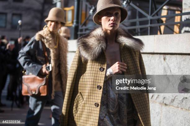 Looks from the Marc Jacobs show on the street on February 17, 2017 in New York City.