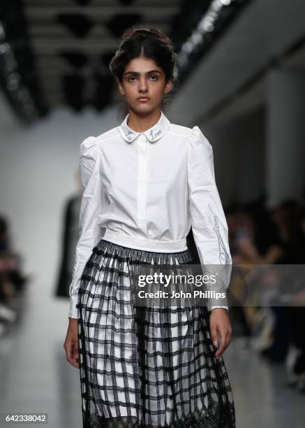 Model walks the runway at the Bora Aksu show during the London Fashion Week February 2017 collections on February 17, 2017 in London, England.