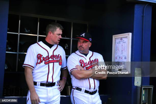 Wild Card Game: Atlanta Braves Chipper Jones with manager Fredi Gonzalez in dugout before game vs St. Louis Cardinals at Turner Field. Final game of...