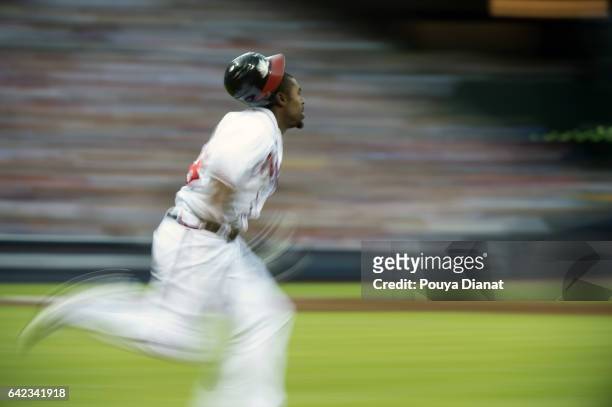 Wild Card Game: Blurred view of Atlanta Braves Michael Bourn in action, running bases vs St. Louis Cardinals at Turner Field. Final game of Chipper...