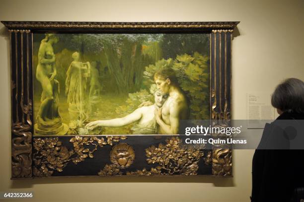 Visitor looks at the paint 'La edad de oro' by Janos Vaszary during the press preview of the exhibition 'Obras maestras de Budapest' at...