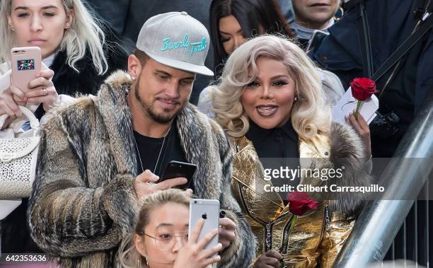 Model Char DeFrancesco and rapper Lil' Kim are seen at the Marc Jacobs Fall 2017 Show at Park Avenue Armory on February 16, 2017 in New York City.