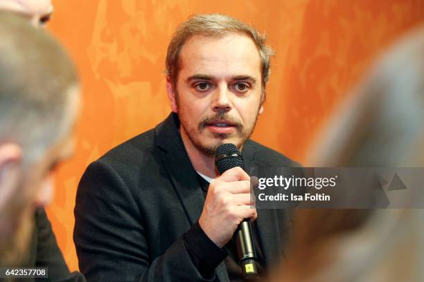 Actor Richard Kropf discuss with host Caro Matzko during the Berlinale Open House Panel '4 Blocks' at Audi Berlinale Lounge on February 17, 2017 in...