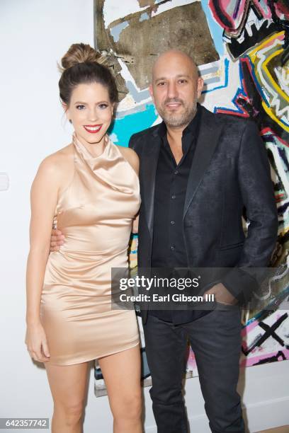 Television Personality Stephanie Bauer and gallery owner Steph Sebbag attend the Power To The Planet Exhibition Opening at De Re Gallery on February...