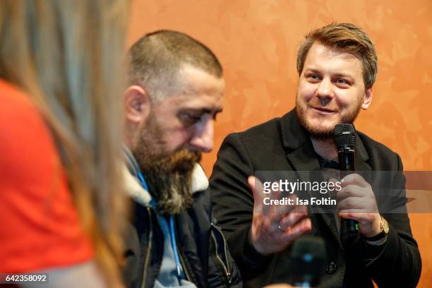 Actor Kida Khodr Ramadan and director Marvin Kren discuss with host Caro Matzko during the Berlinale Open House Panel '4 Blocks' at Audi Berlinale...