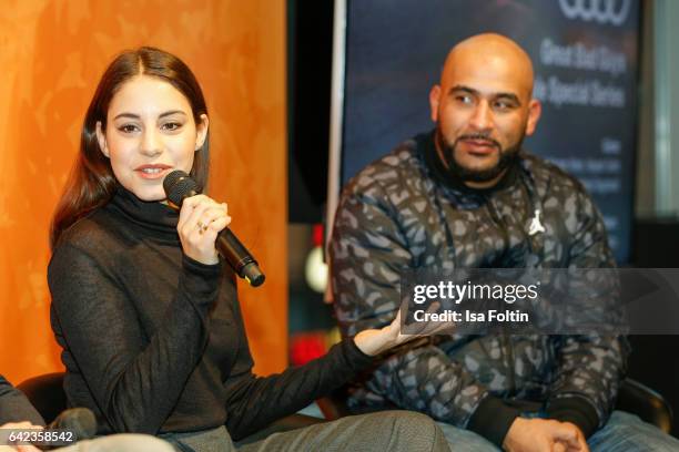 Actress Almila Bagriacik and rapper and actor Veysel Gelin discuss with host Caro Matzko during the Berlinale Open House Panel '4 Blocks' at Audi...