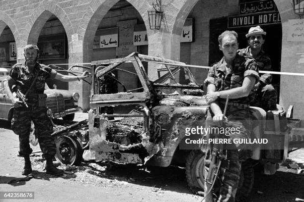 Israeli soldiers stand near a destroyed jeep in front of Rivoli hotel in Salah e-Din Street in Jerusalem in June 1967 during the six-day war. On 05...