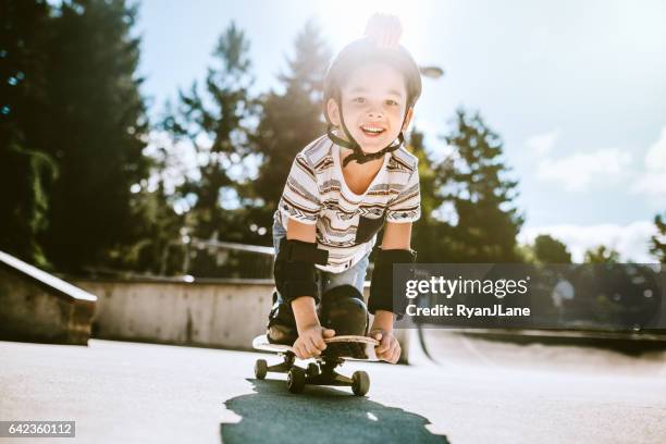 hispanic boy at skateboard park - skateboard park stock pictures, royalty-free photos & images