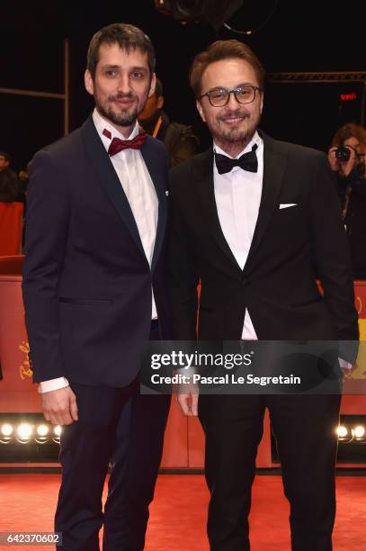 Actor Mircea Postelnicu and director Calin Peter Netzer attend the 'Ana, mon amour' premiere during the 67th Berlinale International Film Festival...