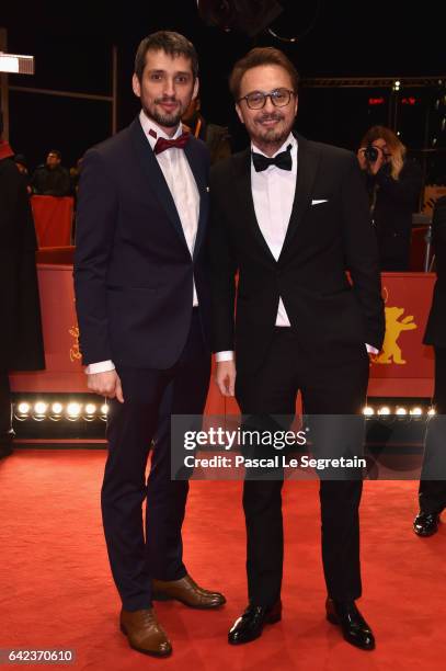 Actor Mircea Postelnicu and director Calin Peter Netzer attend the 'Ana, mon amour' premiere during the 67th Berlinale International Film Festival...