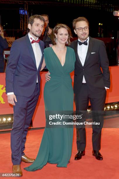 Actors Mircea Postelnicu, Diana Cavallioti and director Calin Peter Netzer attend the 'Ana, mon amour' premiere during the 67th Berlinale...