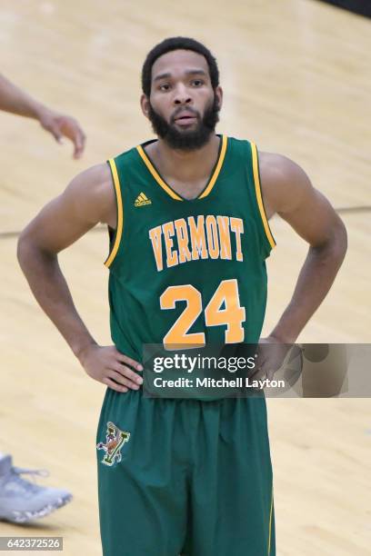 Dre Wills of the Vermont Catamounts looks on during a college basketball game against the UMBC Retrievers at the RAC Arena on February 12, 2017 in...