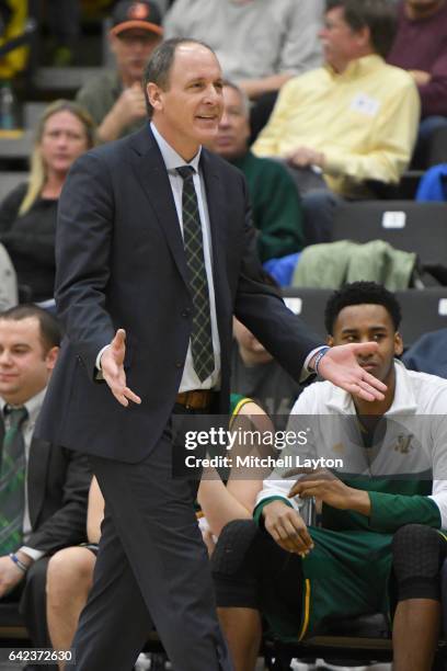 Head coach John Becker of the Vermont Catamounts argues a call during a college basketball game against the UMBC Retrievers at the RAC Arena on...