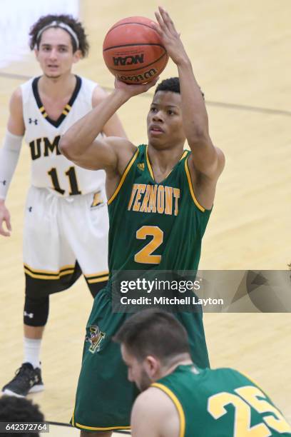 Trae Bell-Haynes of the Vermont Catamounts takes a foul shot during a college basketball game against the UMBC Retrievers at the RAC Arena on...