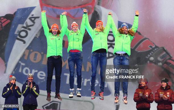 Laura Dahlmeier, Franziska Hildebrand, Maren Hammerschmidt and Vanessa Hinz of Germany celebrate on the podium of the 2017 IBU World Championships...
