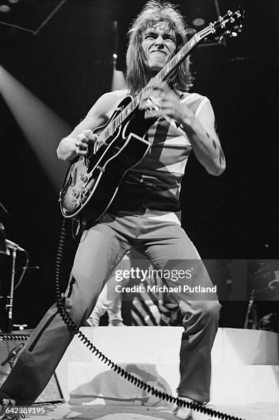 Guitarist Steve Howe performing with English progressive rock group, Yes, at Madison Square Garden, New York City, September 1978. The band played...