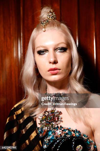 Model poses backstage ahead of the Limkokwing University show at Fashion Scout during the London Fashion Week February 2017 collections on February...