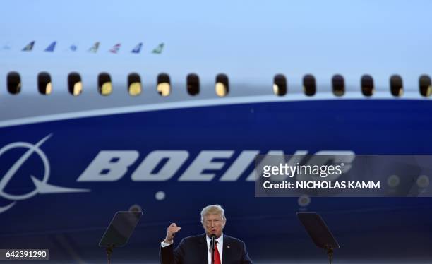 President Donald Trump speaks at the Boeing plant in North Charleston, South Carolina, on February 17, 2017. / AFP PHOTO / Nicholas Kamm