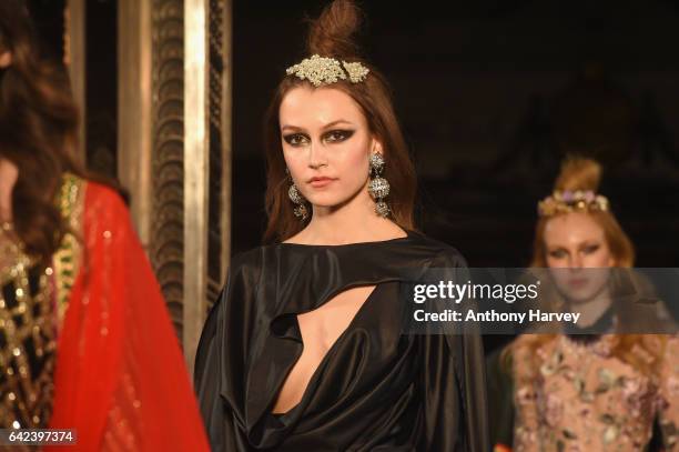 Models walk the runway at the Limkokwing University show at Fashion Scout during the London Fashion Week February 2017 collections on February 17,...