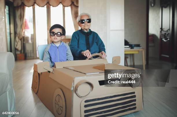 cardboard car - cardboard car stock pictures, royalty-free photos & images