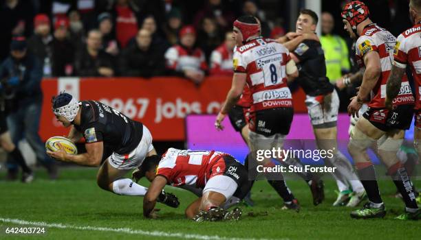 Saracens hooker Schalk Brits goes over for the first try during the Aviva Premiership match between Gloucester Rugby and Saracens at Kingsholm...