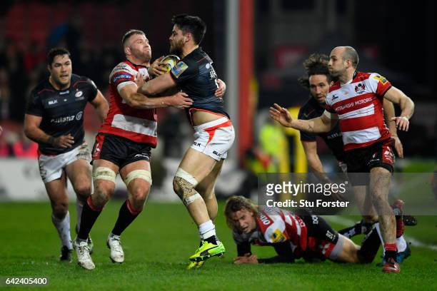 Saracens full back Sean Maitland runs into the tackle of Ross Moriarty during the Aviva Premiership match between Gloucester Rugby and Saracens at...