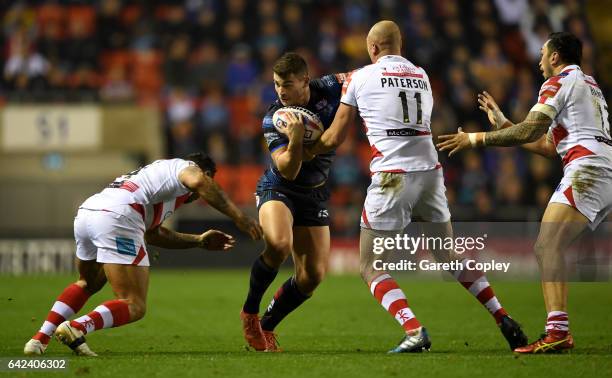 Stevie Ward of Leeds is tackled by Cory Paterson of Leigh during the Betfred Super League match between Leigh Centurions and Leeds Rhinos at Leigh...